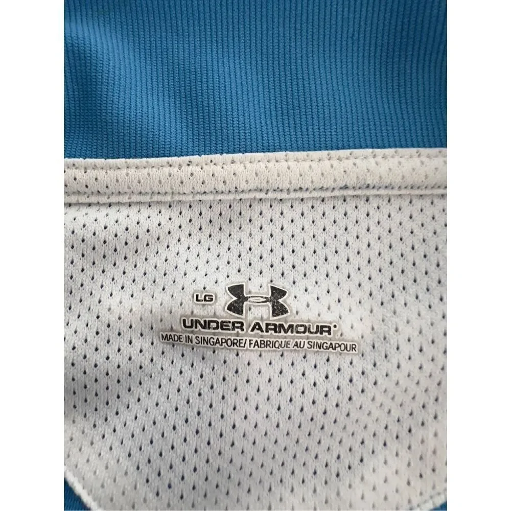 Under Armour youth large zip front polo